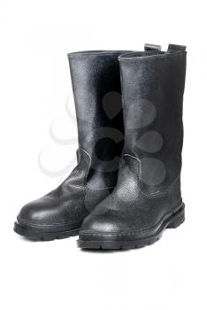 Working or military man's boots black isolated on a white 


