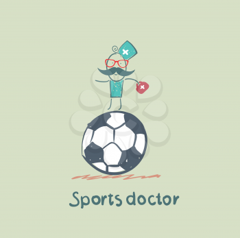 Sports doctor sits on a huge soccer ball