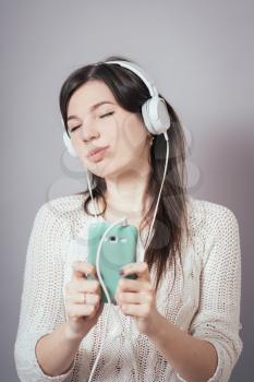 Girl listening to music from your phone