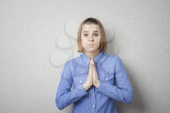young girl praying