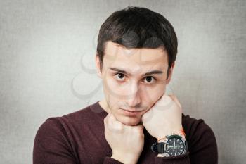 stylish businessman with a clock on the hand