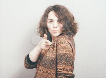 woman pointing to you