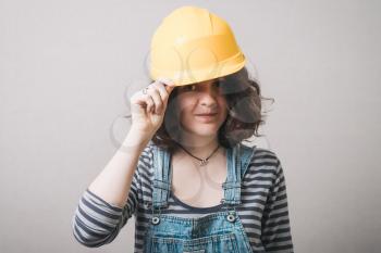 portrait of a girl in a yellow helmet