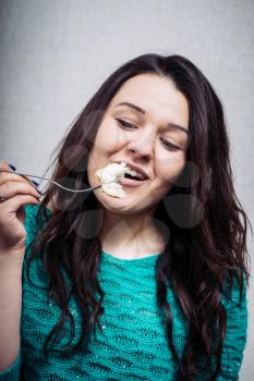 young woman with a fork