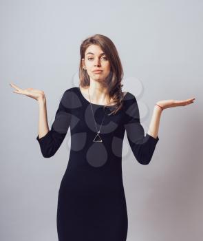 on a white background young girl throws up his hands