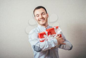 Businessman hold with gift box