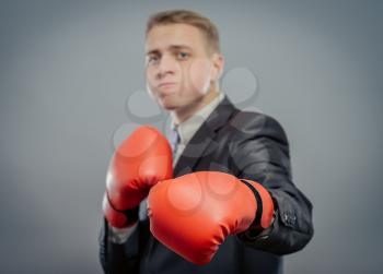 businessman in boxing gloves isolated 