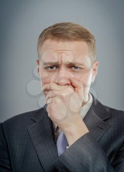 Young businessman sorrow thinking