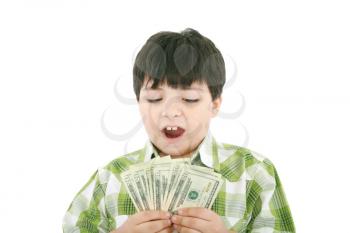 A smiling little boy is counting money - on white background 
