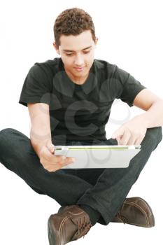 Young man using a touch pad PC, isolated on white