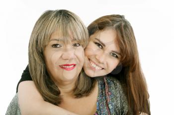 Photo of attractive woman and her young daughter looking at camera