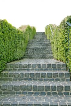 A long stone staircase isolated over a white background