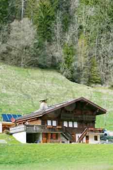 Mountain wooden house in Swiss Alps 

