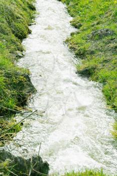 Waterfall in green nature in Switzerland 
