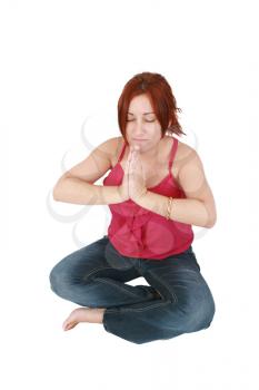 Calm woman doing relaxing yoga exercises 