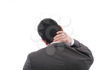 Young businessman having neck pain 