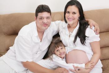 Hispanic family expecting new baby