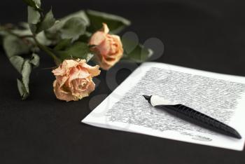 Royalty Free Photo of Roses and a Love Letter