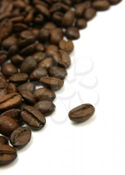 Curved coffee beans isolated on white