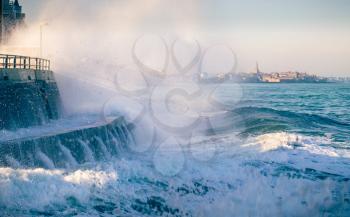 High tide and splashing wave in Saint Malo, Brittany, France