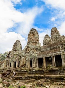 Bayon Khmer Temple stone ruins at Angkor, Siem Reap, Cambodia.