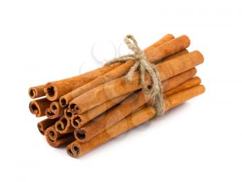 Royalty Free Photo of a Bundle of Cinnamon Sticks Bound with Twine