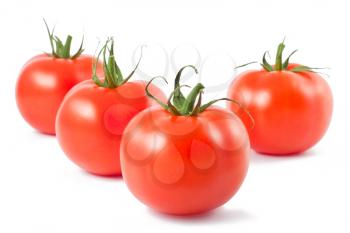 Royalty Free Photo of Four Ripe Tomatoes