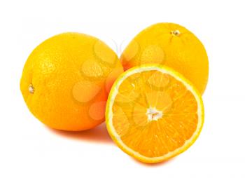 Sliced and whole orange fruits  isolated on white background