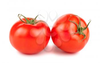 Two ripe red tomatoes isolated on white background