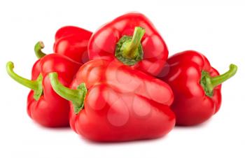 Group of ripe red sweet peppers isolated on white background