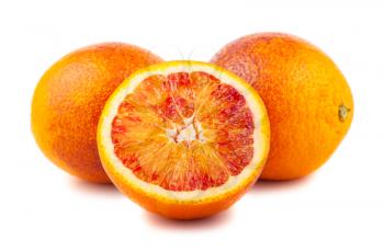 Whole and half of blood red oranges isolated on white background