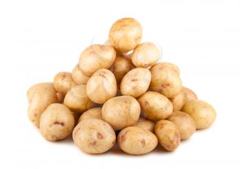 Big heap of uncooked ripe potato isolated on white background