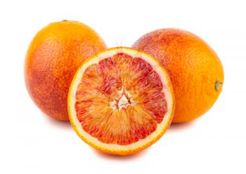 Half and full bloody red oranges isolated on white background