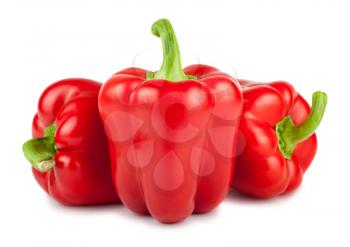 Three red ripe bulgarian peppers isolated on white background