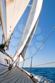 Royalty Free Photo of a Yacht Sailing the Sea