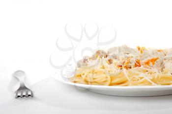 Spaghetti with meat and carrrot on dish isolated on white, cropped
