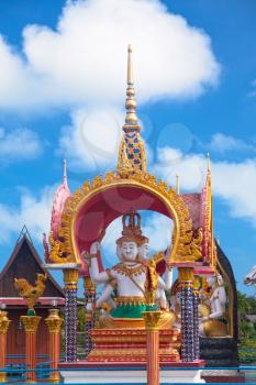 Buddha statue in Wat Plai Laem - buddhist temple on Koh Samui, Thailand
