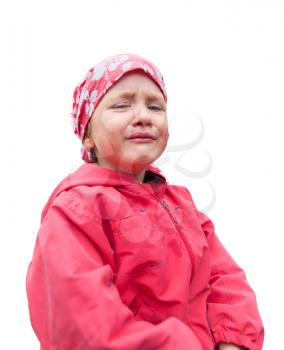 Crying small girl in red clothes isolated on white
