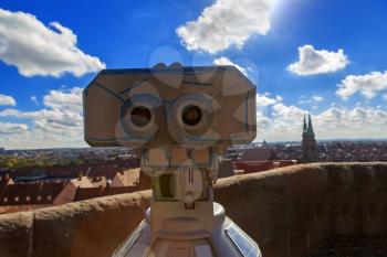 Telescope in the Nuremberg castle, view of the city, church, sky, clouds
