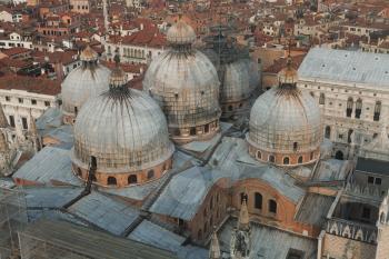 San Marco Basilica domes and roofs of venetian houses, top view
