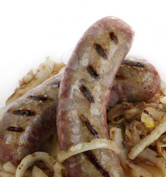 Fried Sausages With Sauerkraut And Onion