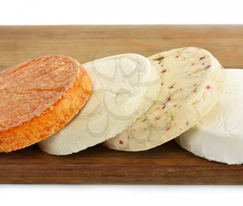 Assortment Of Cheese On A Cutting Board