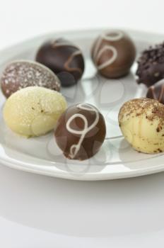 assortment of chocolate eggs on a plate