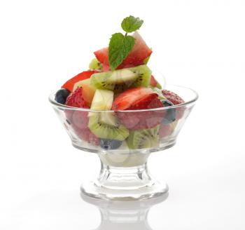 fresh fruit salad in a glass dish 