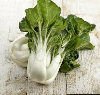 Fresh White Choy Sum Stalks With  Green Leaves 