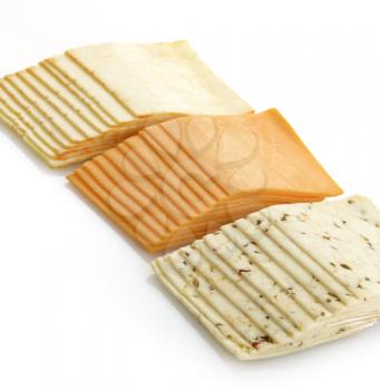 Assortment Of Cheese Slices On White Background