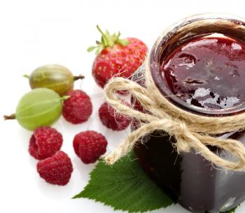 Glass Jar Of Jam And Fresh Berries