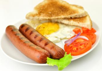 grilled polish sausages with egg and vegetables 