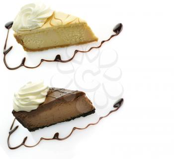  chocolate and vanilla cheesecake with whipped cream. 