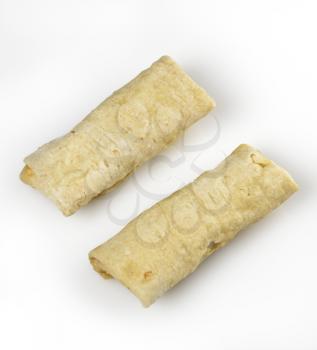 Two Mexican Burritos On White Background